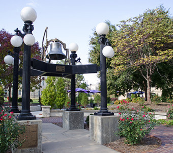 Bluemont Bell in modern courtyard west of Bluemont Hall, K-State campus, Manhattan, KS. (https://coe.k-state.edu/about/news-events/history/bluemont-bell.html)