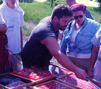 Informant Scott displaying his collection to the 2003 KAFS students.