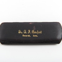 The cover of the glasses with the Barfoot name embossed in the case