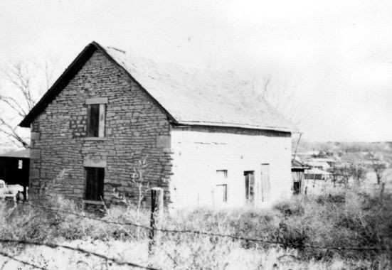 Stone barn on the historic property of Isaac Goodnow in Manhattan, KS. (KansasMemory.org, Kansas Historical Society, Copy and Reuse Restrictions Apply)