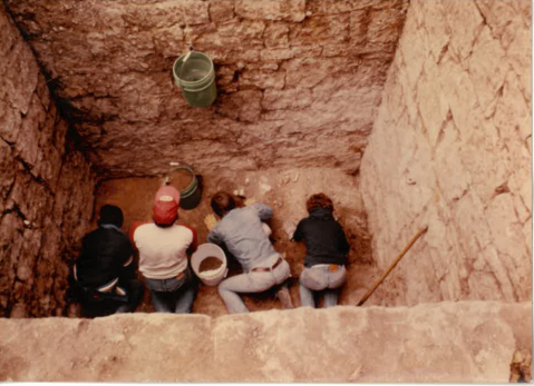 Students excavating the base of the large stone vault of the Ft Riley hospital privy. (Image courtesy of Fort Riley, Conservation Branch)