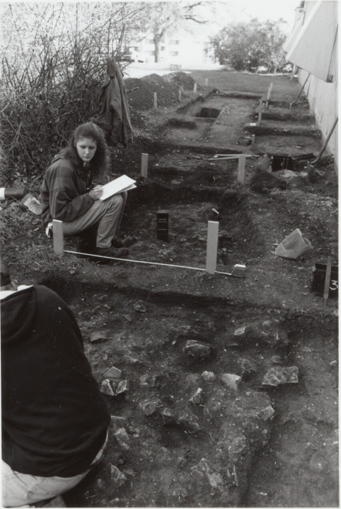 Students excavate a portion of the old college wall.