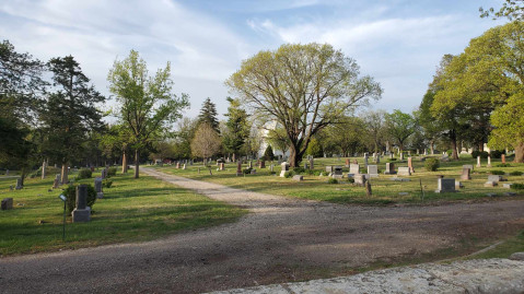 View of Sunset Cemetery from central portion showing various tombstones. (Photo courtesy of Anna Poggi-Corradini)