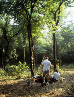 Two students conducting archaeological excavations in the woods at the Quarry Creek site, June 1991..