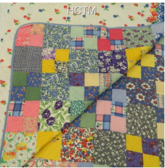 A feed sack quilt made in the 1930s from the Kansas State Historic Costume and Textile Museum.