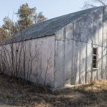 This small shed is affectionately called the Machine Shop. It was here that Clyde Cessna, his wife, and his children lived from 1912-1914 until a house was moved to the property.  Courtesy of the Chapman Center of Rural Studies.